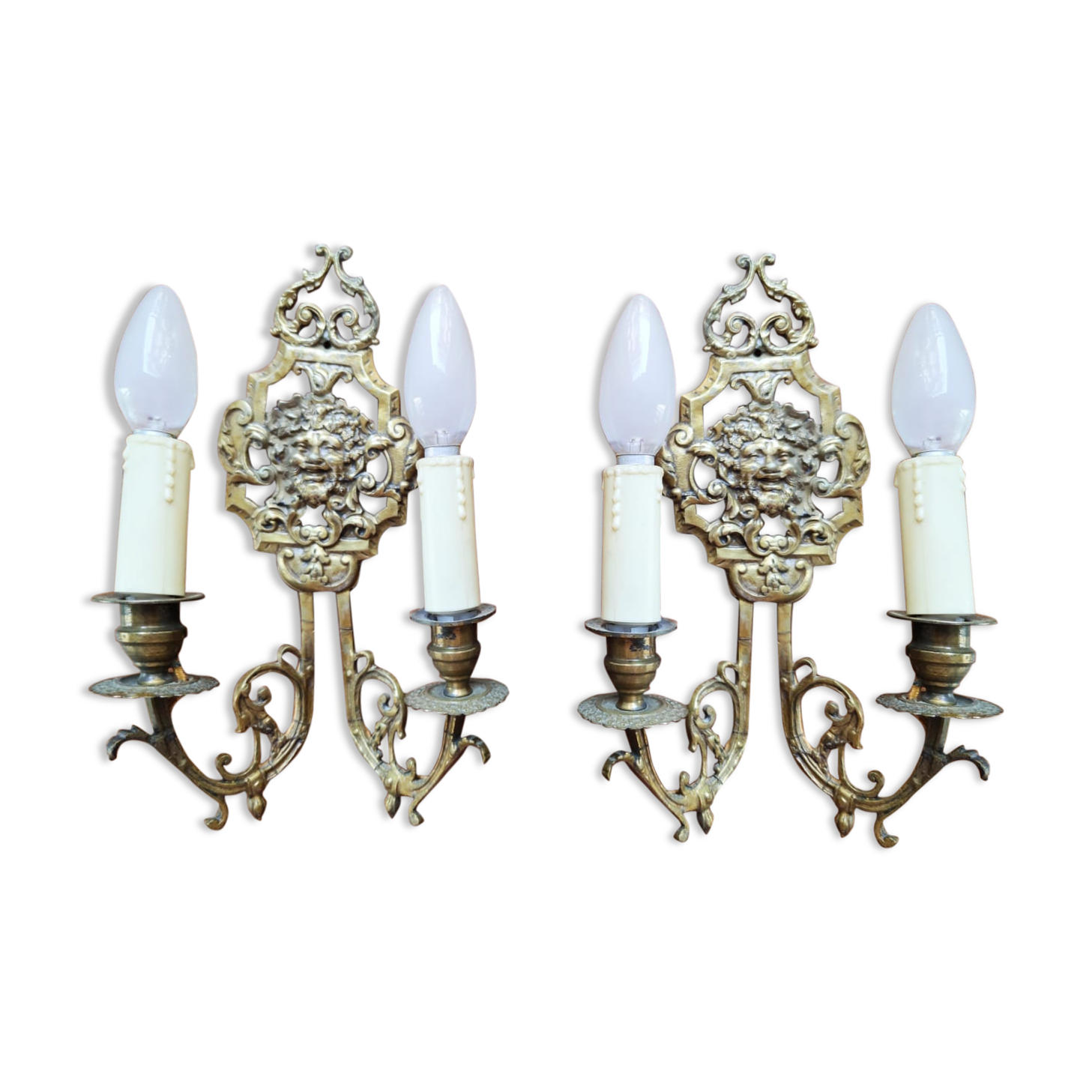 Pair of gilded bronze sconces decorated with Louis XIV style mascarons