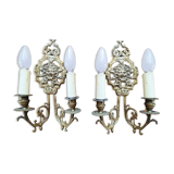 Pair of gilded bronze sconces decorated with Louis XIV style mascarons