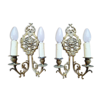 Pair of gilded bronze sconces decorated with Louis XIV style mascarons