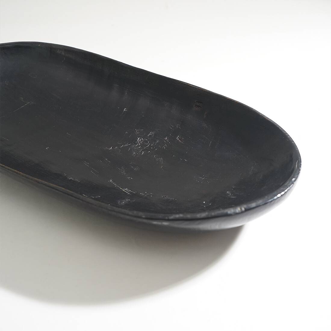 Organic shaped black wooden bowl, 1960s