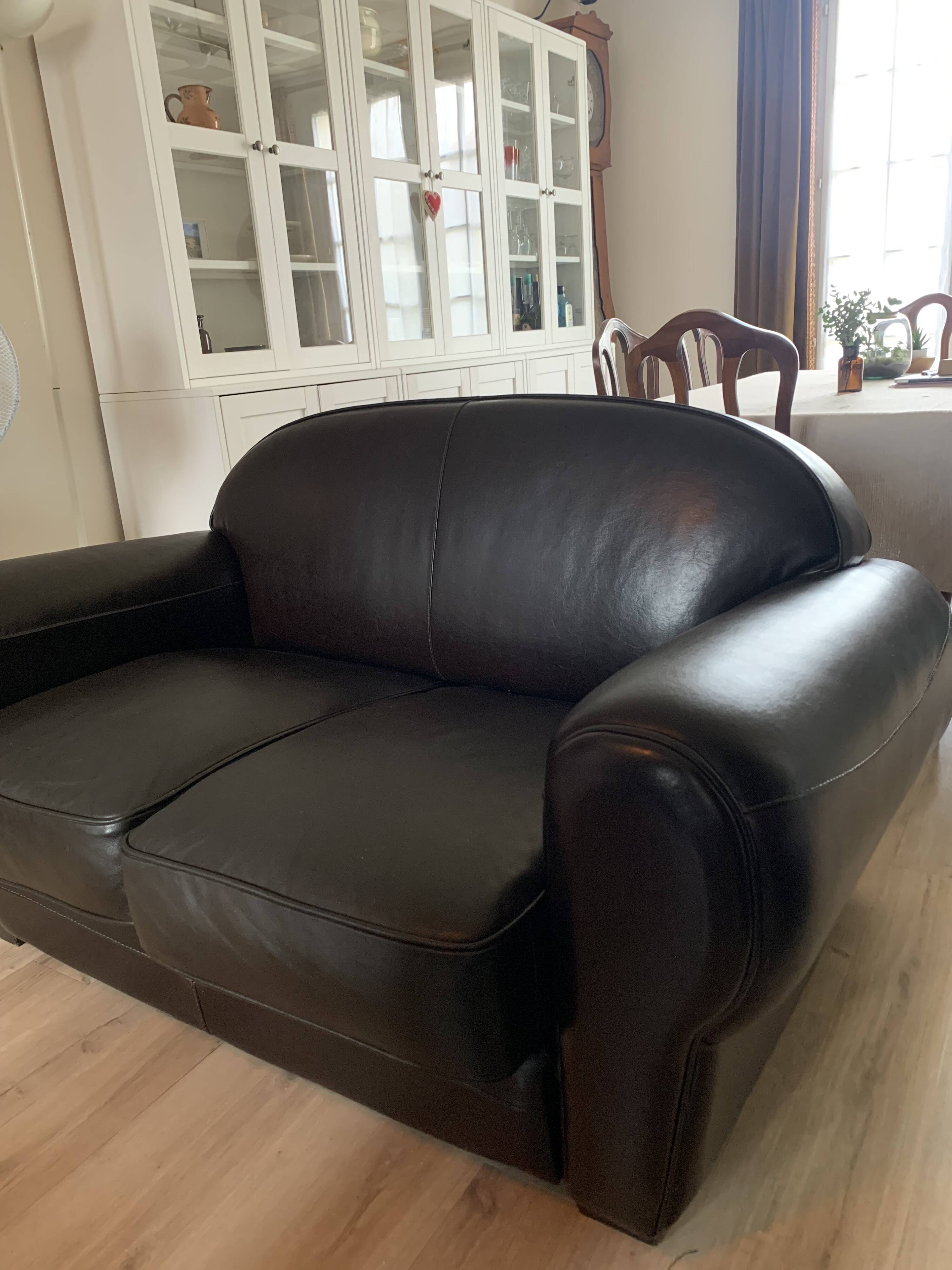 Brown leather club sofa