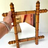 Antique mercury mirror in bamboo-style wood