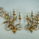 Pair of large floral wall lamps in gilded and lacquered metal. Italy 1960s
