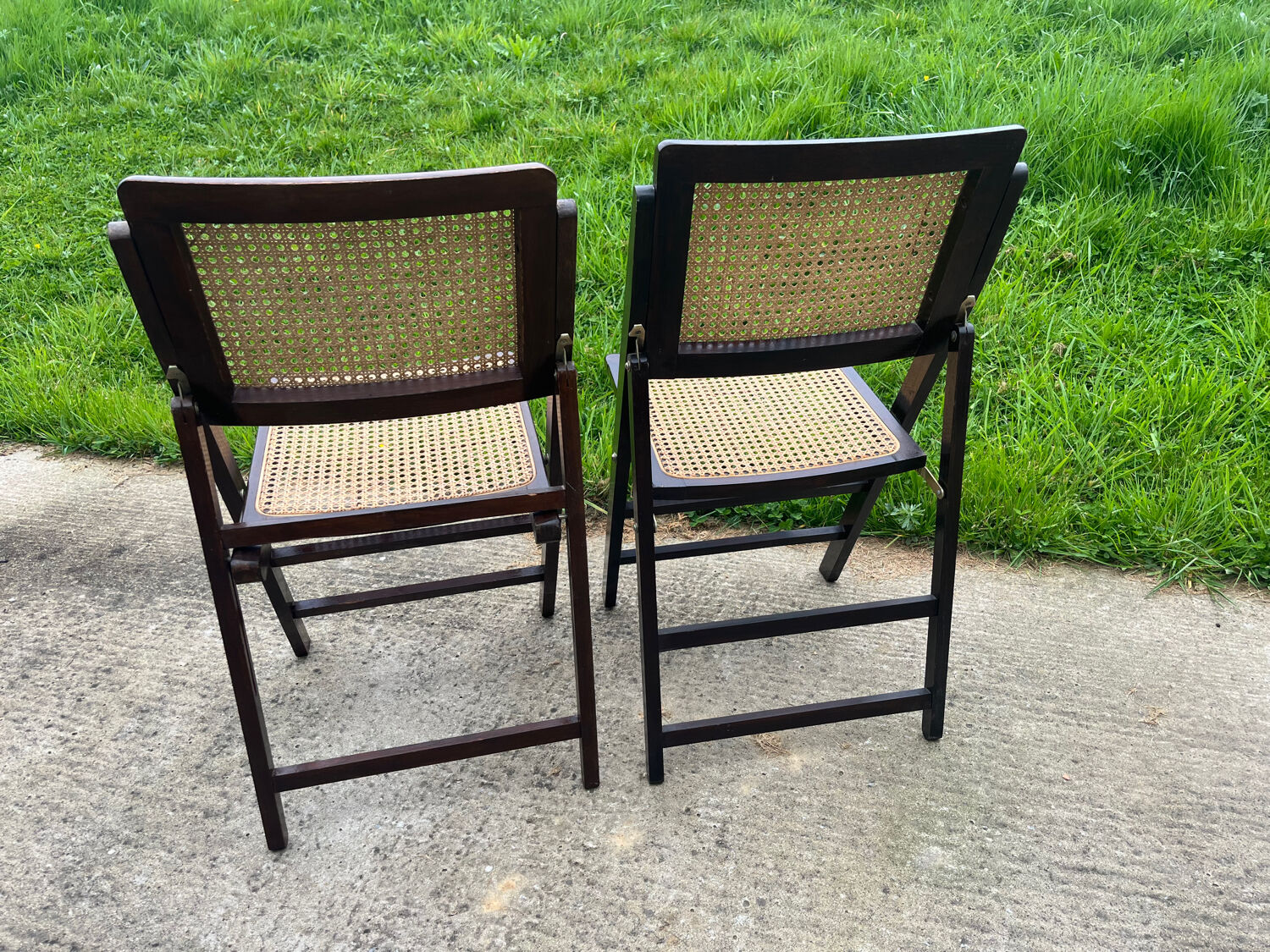 Pair of folding chairs, cane, 70'