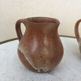 Duo of stoneware milk pitchers