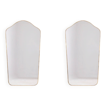 Pair of mirrors in the shape of "gendarme's hat". 1970s.