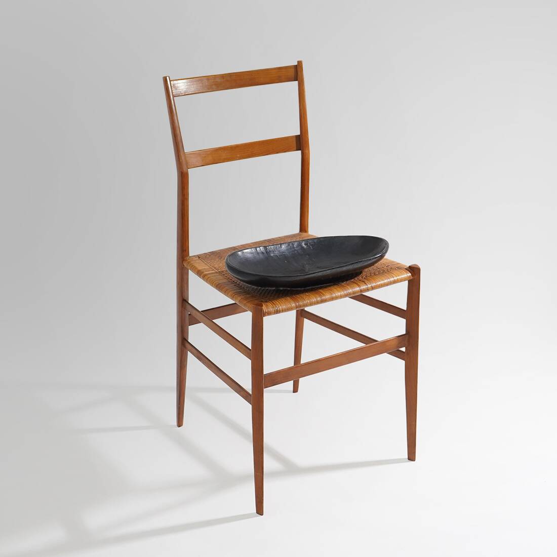 Organic shaped black wooden bowl, 1960s