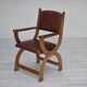 Années 1950, design danois, fauteuil retapissé, cuir marron naturel, bois de chêne.