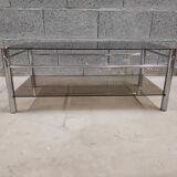Yves Boutboul's vintage coffee table in tempered glass and chrome metal tubes from the 70s