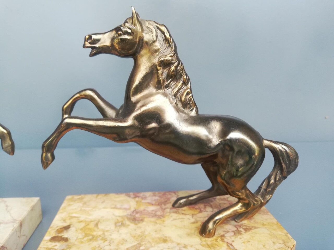 Pair of art deco bookends in bronze and marble