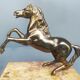 Pair of art deco bookends in bronze and marble