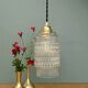 Suspension globe vintage en verre moulé