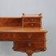 Antique walnut desk with a leather-covered top, Italy, late 19th century.