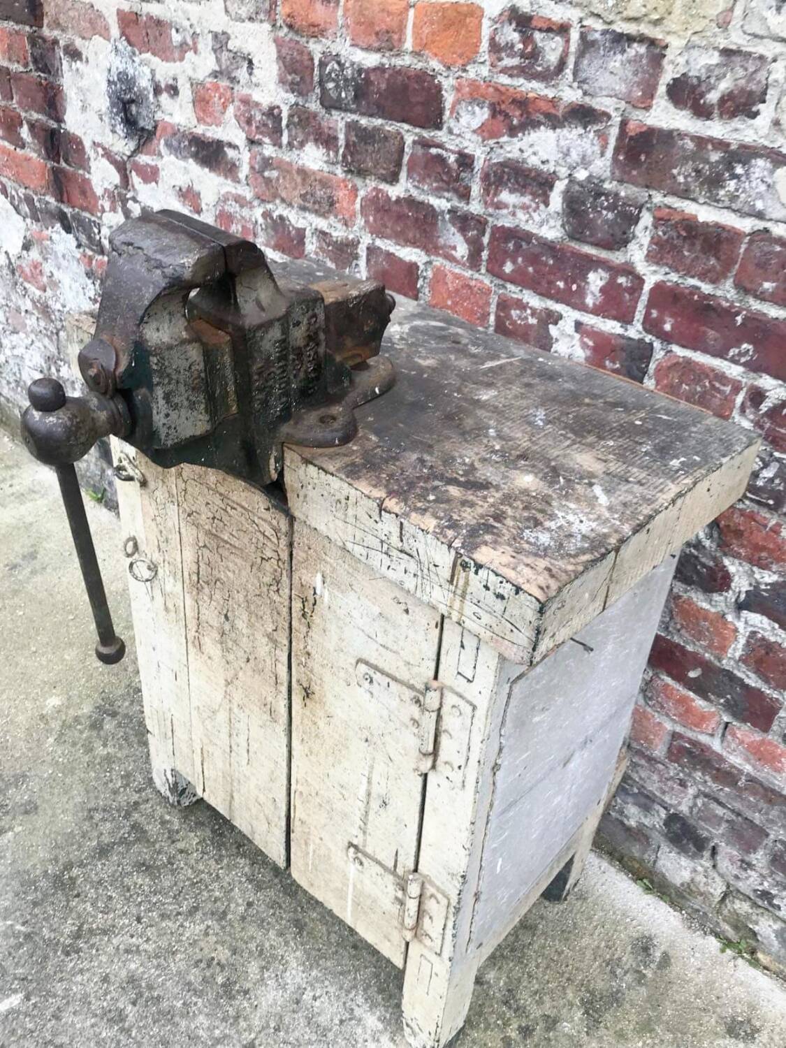 Vintage workbench with vice, old trade furniture