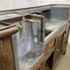 Early 20th-century oak bar counter with period zinc and tin cladding.