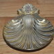 Empty-pocket scallop shell