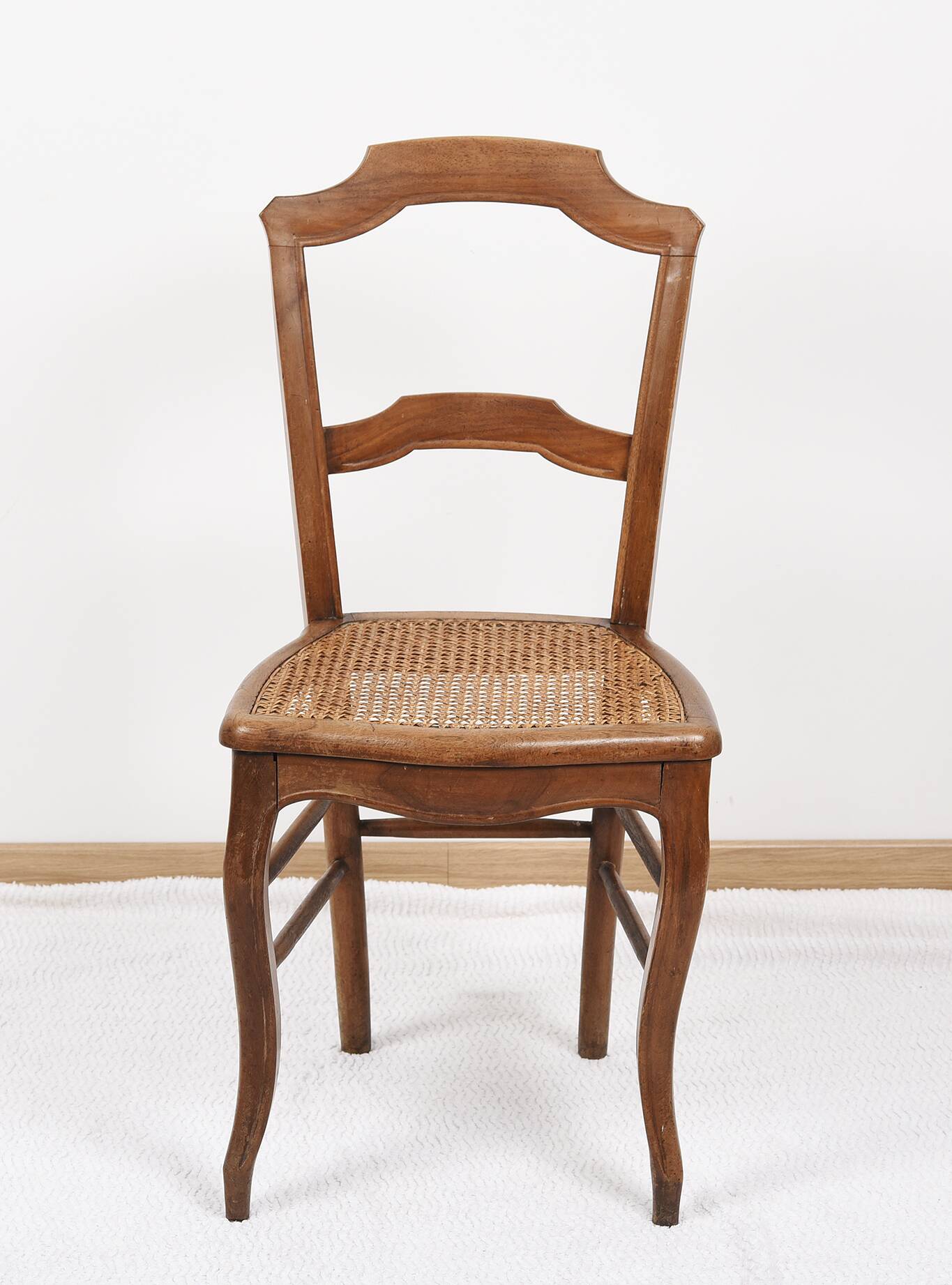 Set of 5 old cane chairs.
