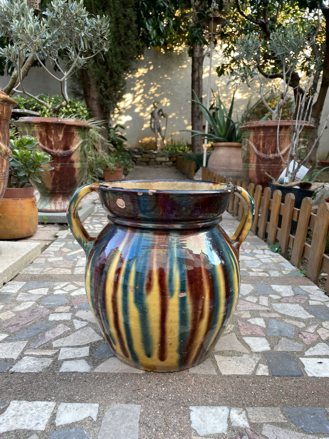 Old flower jar with two glazed earth handles
