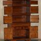 Antique Chinese armoire hand-carved around 1880 with country-style handles.