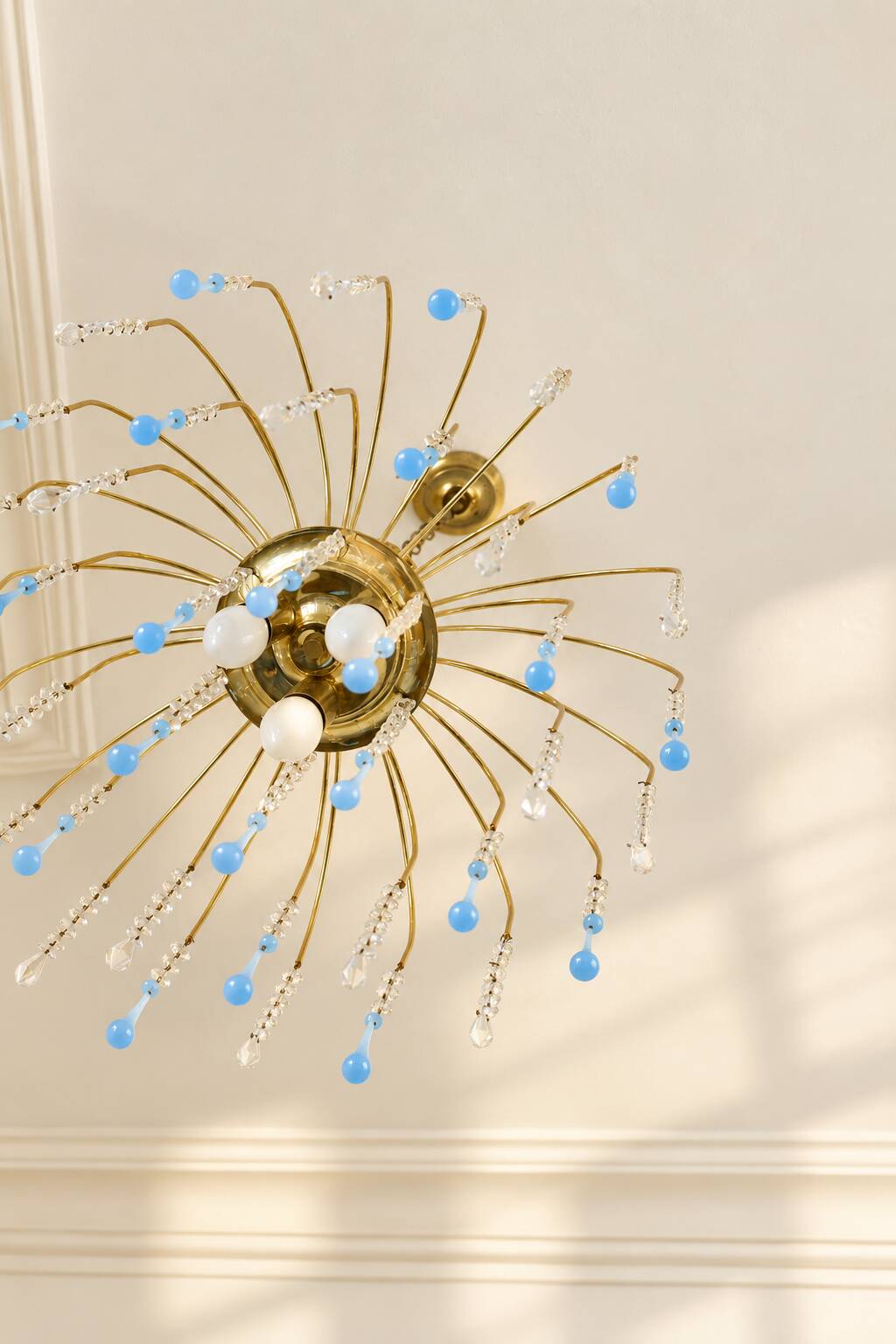 Vintage chandelier with blue Murano glass pendants.