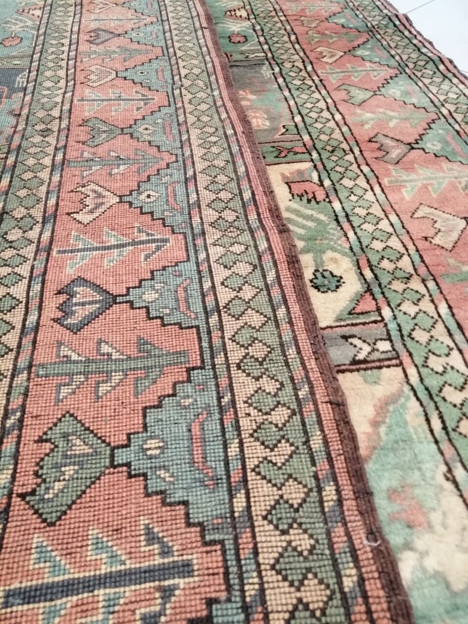 Afghan rug in pastel colors