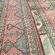 Afghan rug in pastel colors