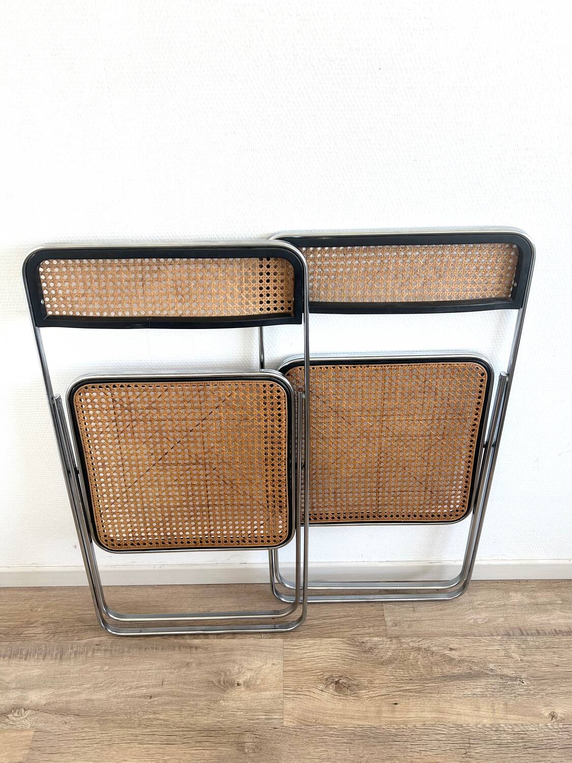 Pair of folding cane chairs