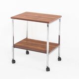 Vintage side table on wheels. Chrome-plated iron tube and wood. France, 1970s.