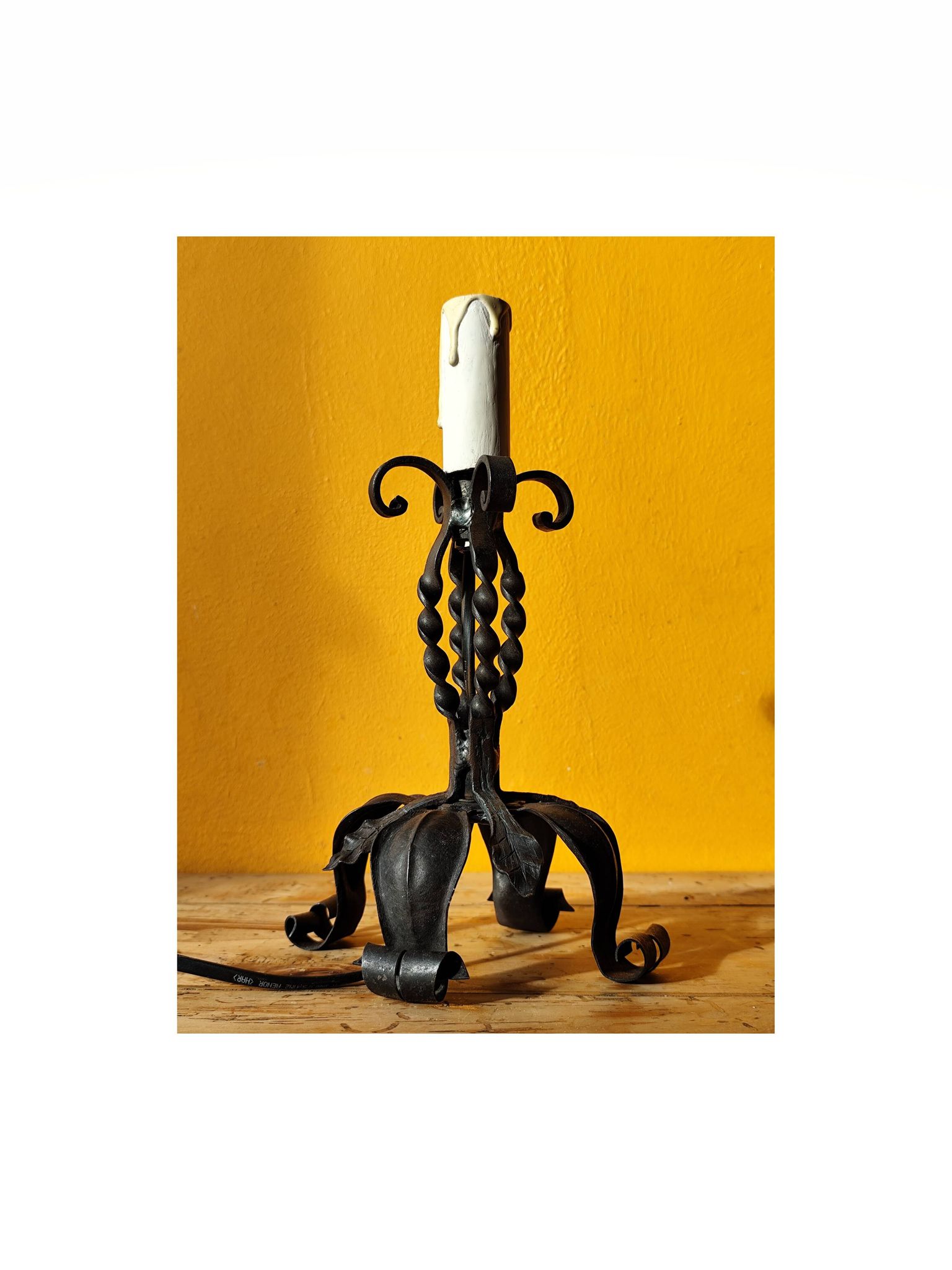 Old metal lamp and fake candle