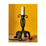 Old metal lamp and fake candle