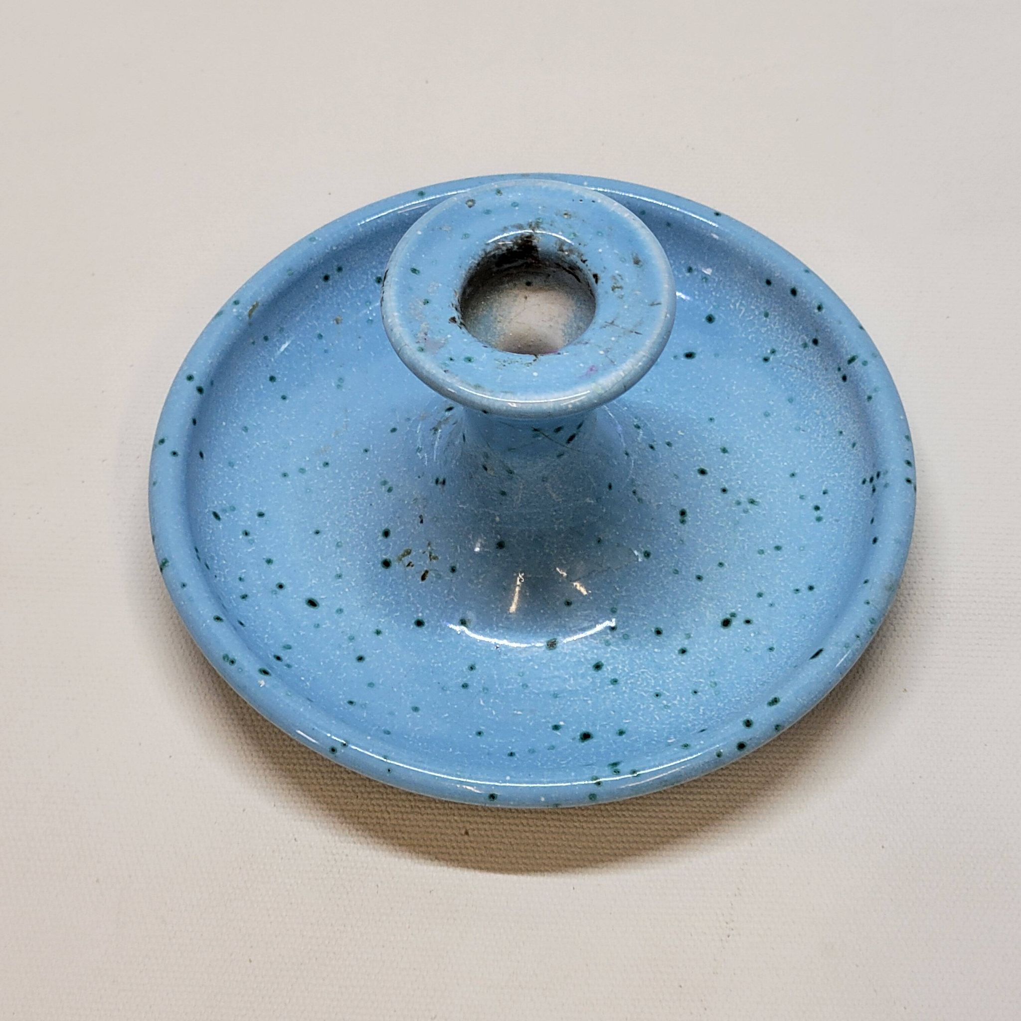 Light blue glazed ceramic candle holder with green speckled signed scorpion stamp