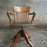 Antique office chair oak adjustable with green leather