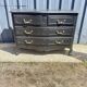 Louis XV style black lacquered chest of drawers with four drawers.