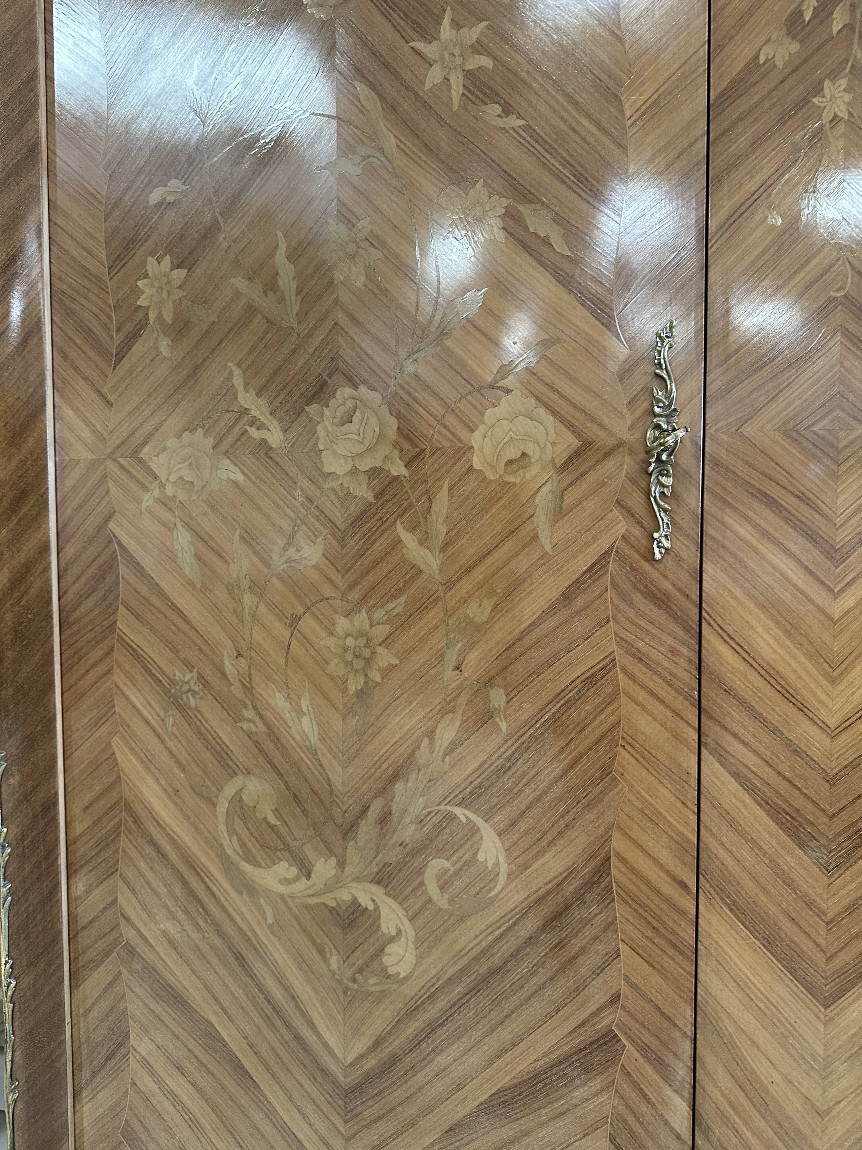Louis XV style two-door wardrobe in rosewood.