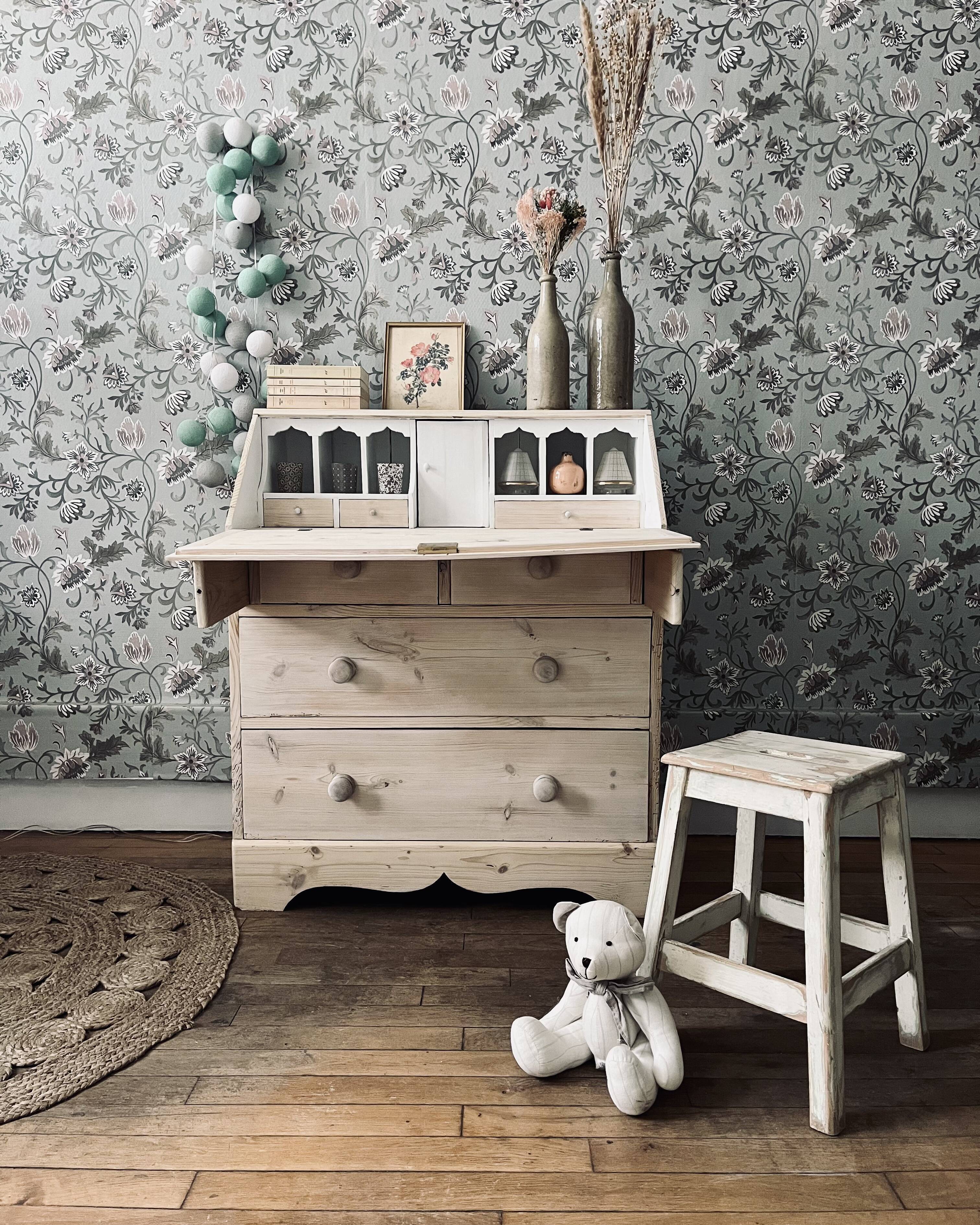 English chest of drawers topped with a sloping secretary