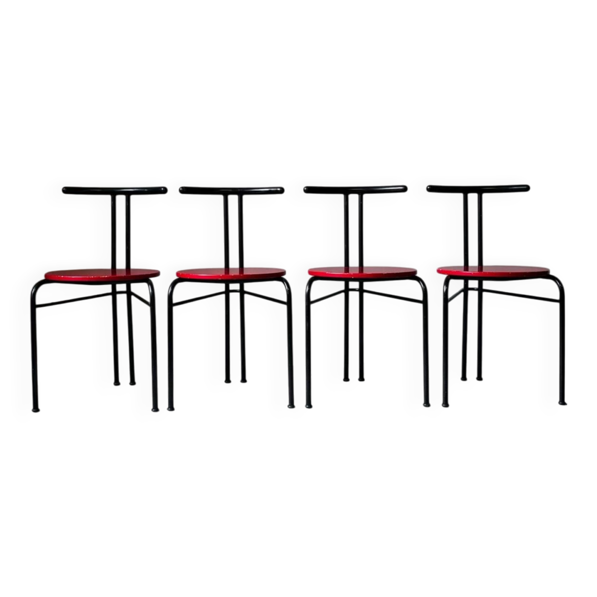 Set of 4 vintage black metal chairs with red lacquered seats.