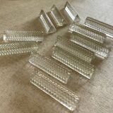 12 portes couteaux en verre.