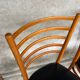 Set of 4 vintage wooden chairs with faux leather.