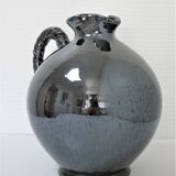 Black pearl glaze ceramic pitcher by Reinhold Rieckmann signed
