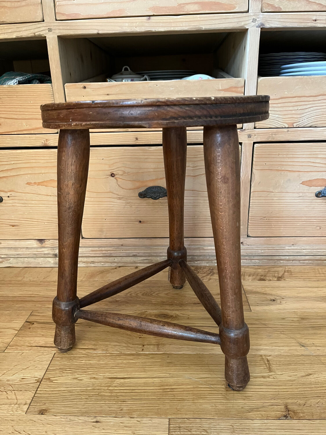 Wooden tripod stool
