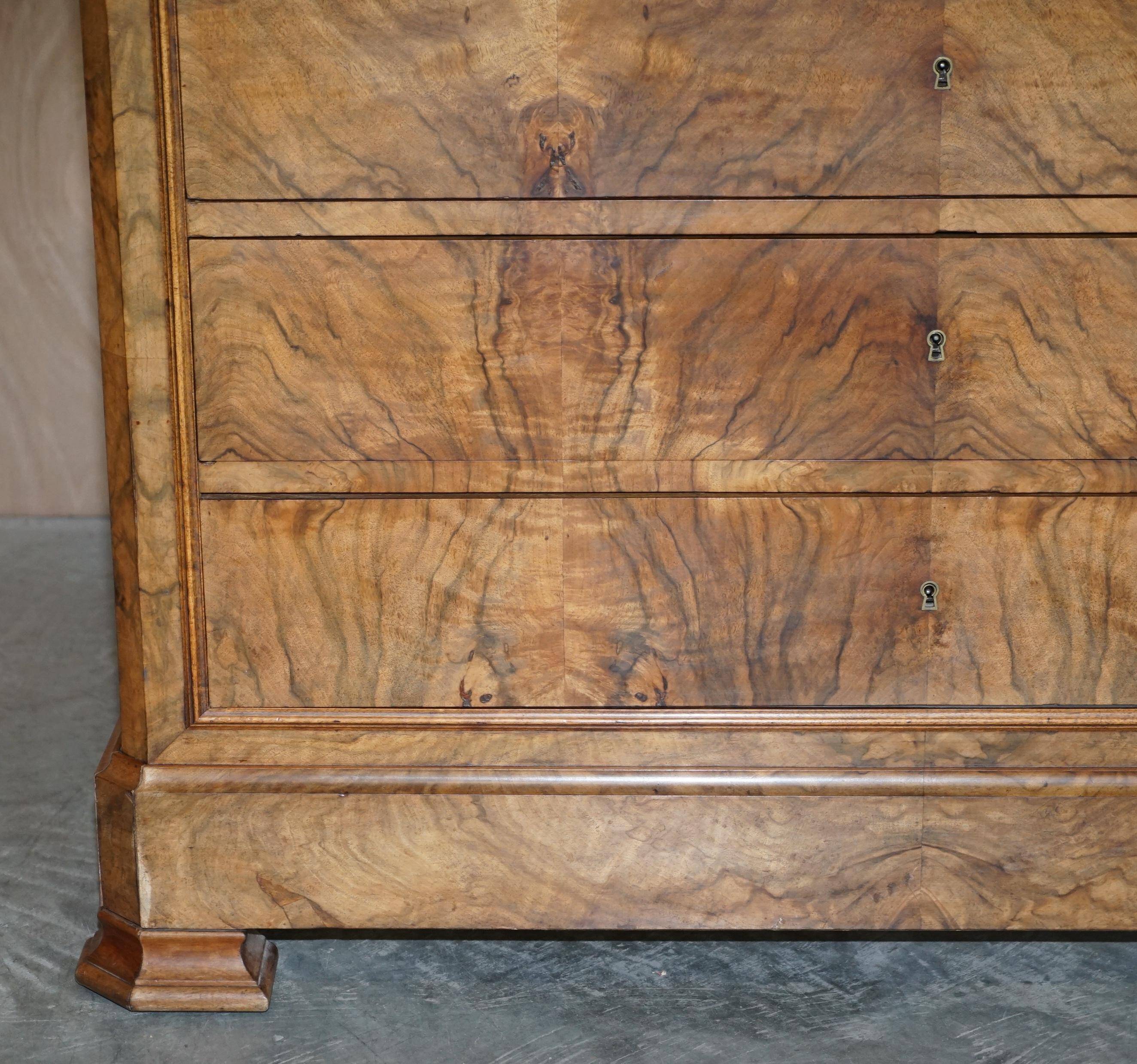 Antique walnut commode from 1860 with a marble top and original key.