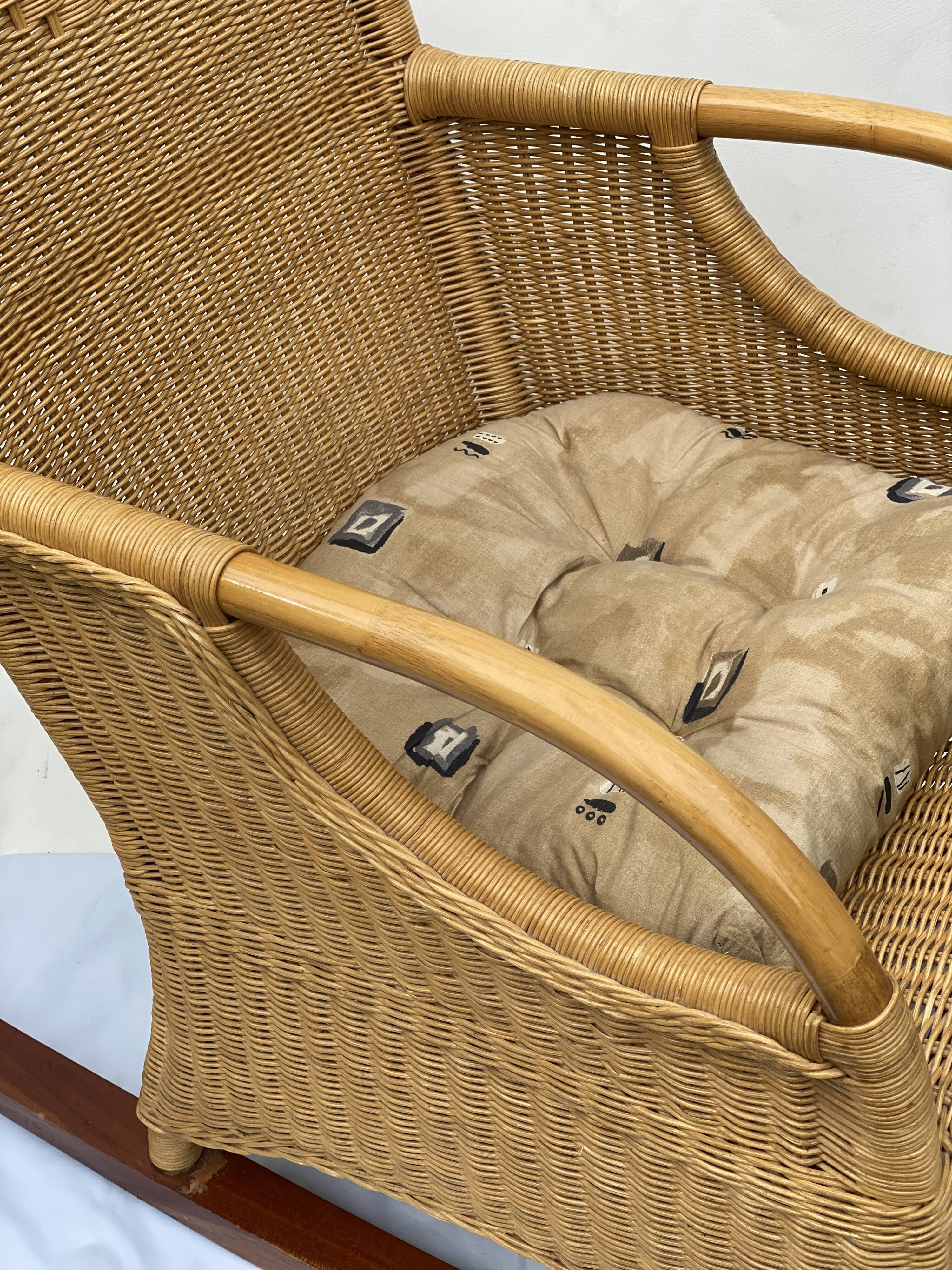 Vintage rotan and teak rocking chair