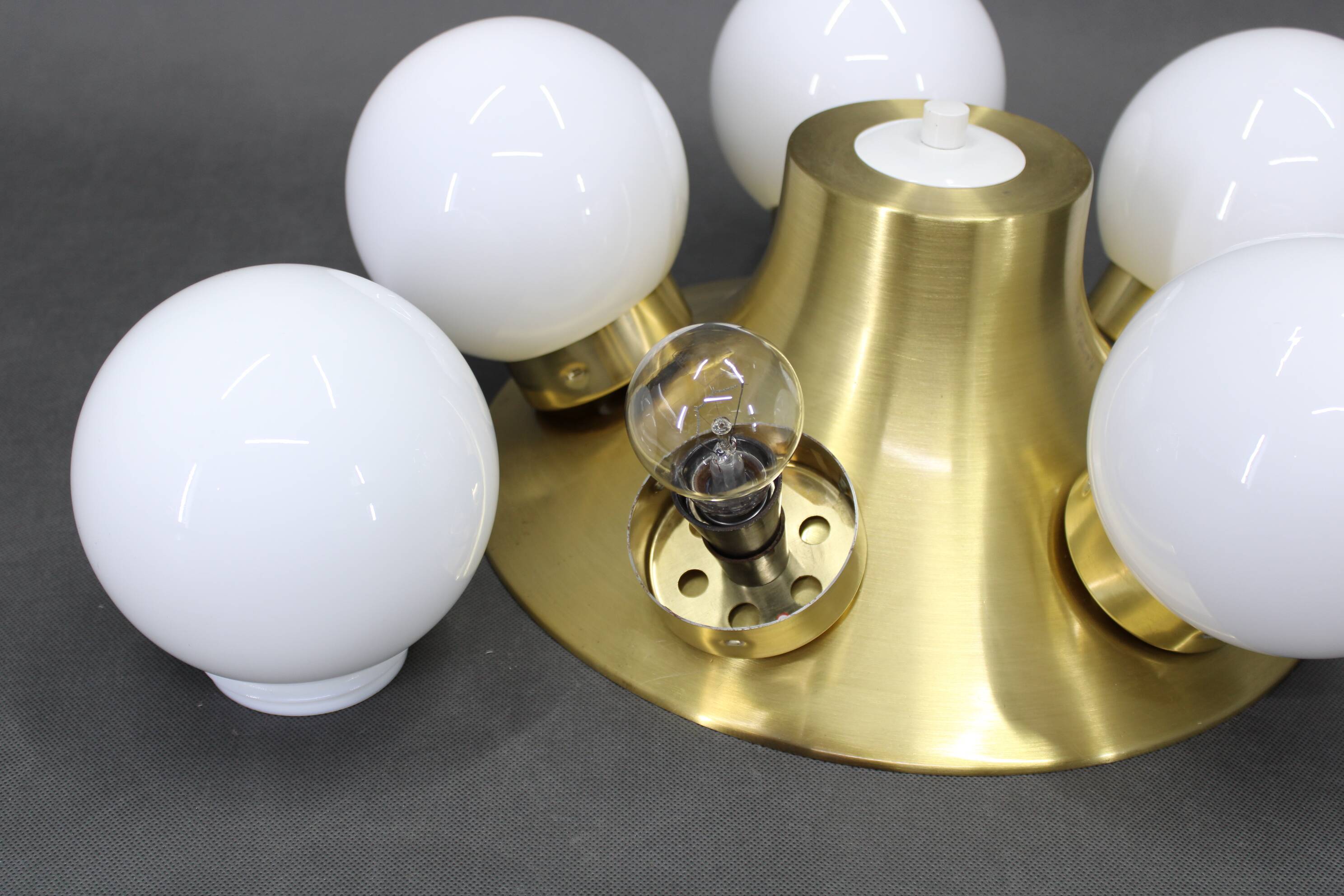 Pair of mid-century brass flush mount lights, 1970s