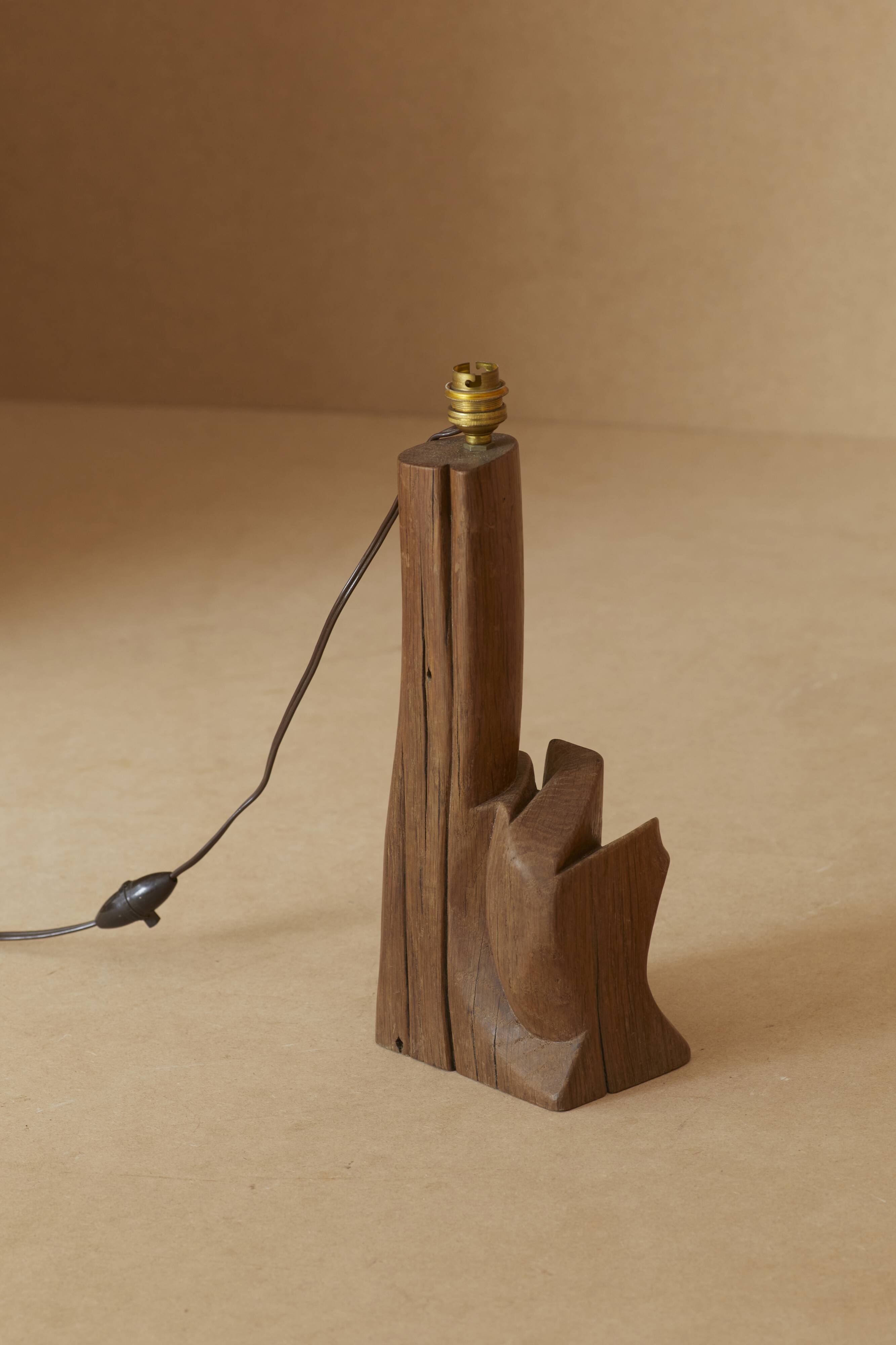 Sculptural lamp in solid wood circa 1960