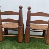 Pair of antique low fire chairs made of wood and straw