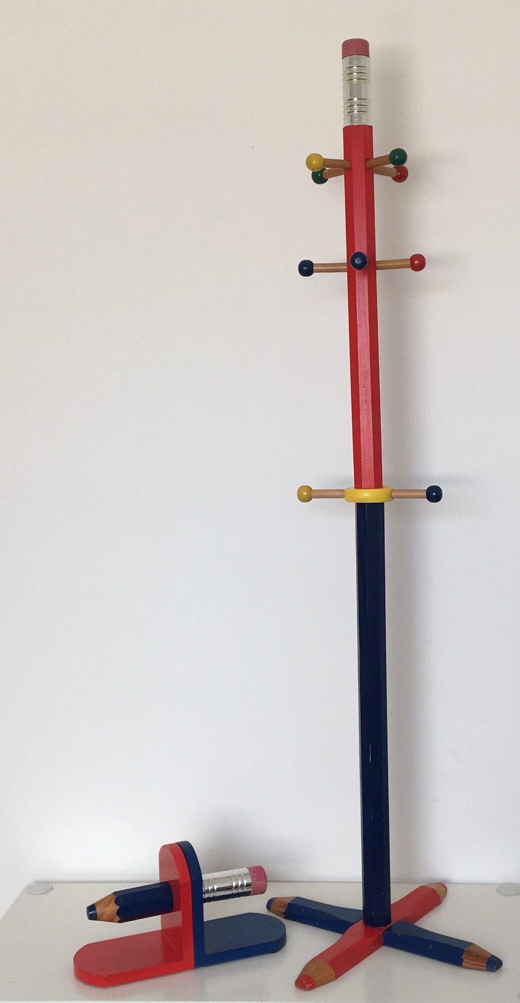Coat rack in the shape of a pencil