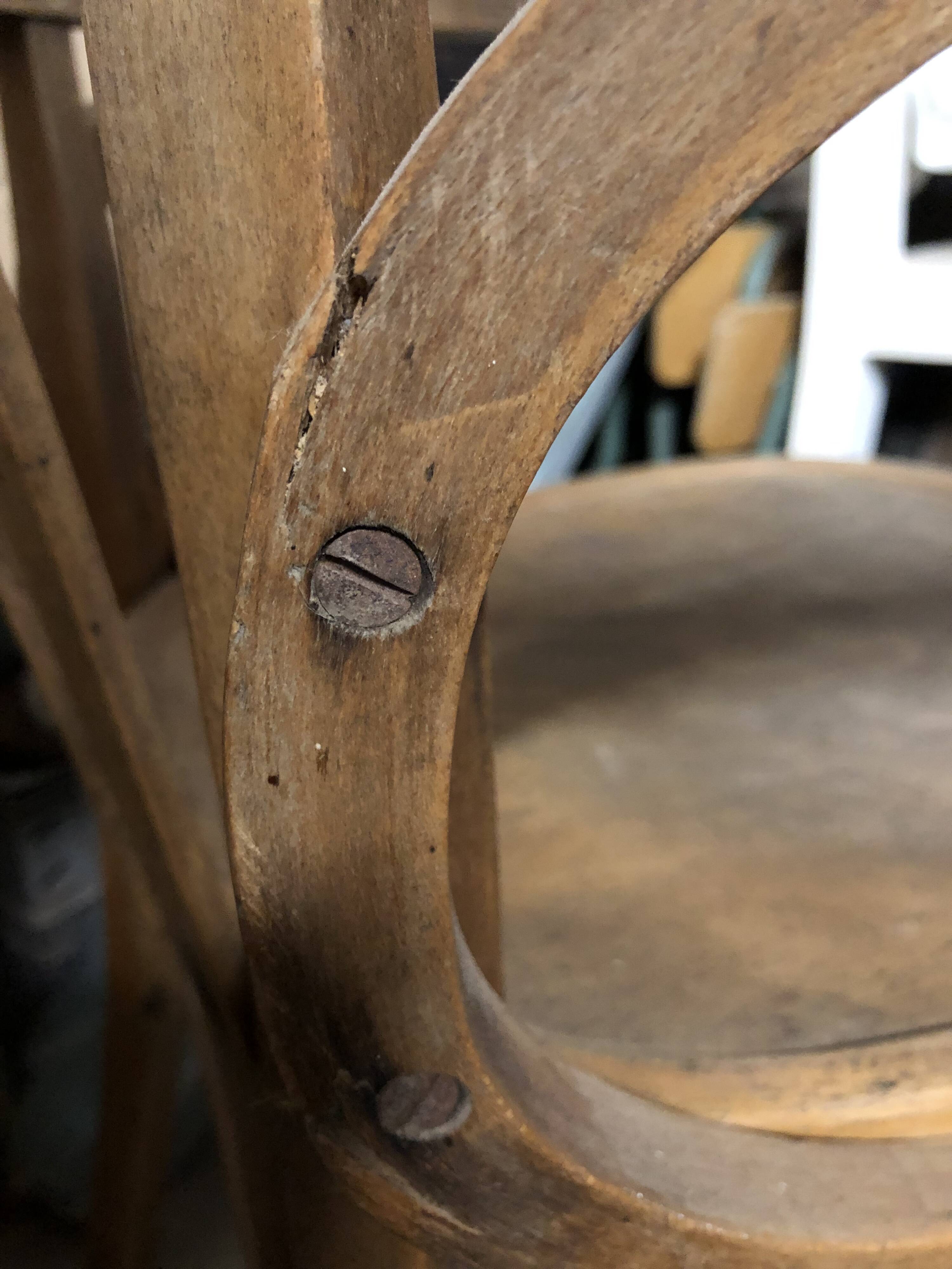 Curved wooden armchair