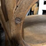Curved wooden armchair