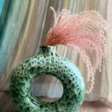 Handmade terracotta donut vase in light green terracotta
