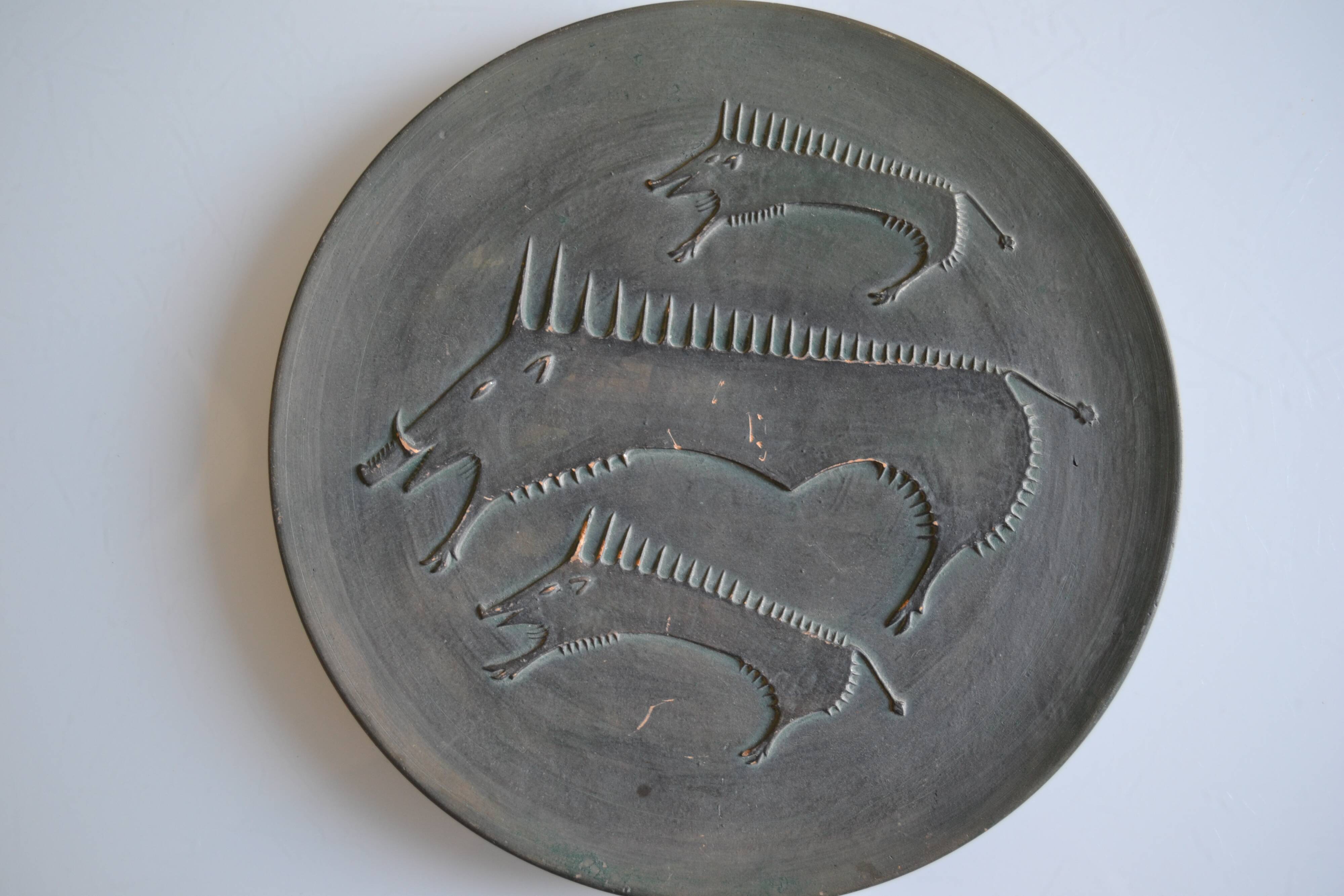 Ceramic wall plate attributed to Wim Mühlendyk